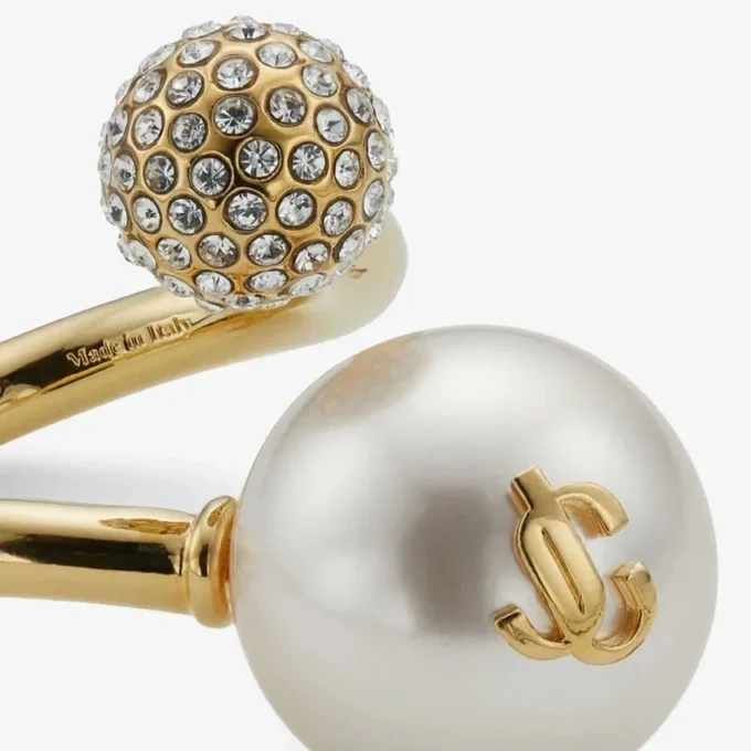Anello Auri Anello in metallo con finitura dorata, perla e cristalli Anello Auri Anello in metallo con finitura dorata, perla e cristalli