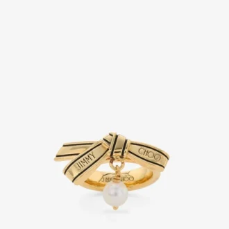 Anello con nastro Anello con perla e nastro in metallo dorato Anello con nastro Anello con perla e nastro in metallo dorato