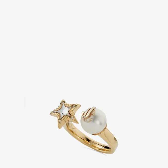 Anello Jc Star Pearl Anello in metallo con finitura dorata con stella in cristallo e perla Anello Jc Star Pearl Anello in metallo con finitura dorata con stella in cristallo e perla