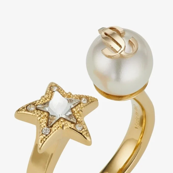 Anello Jc Star Pearl Anello in metallo con finitura dorata con stella in cristallo e perla Anello Jc Star Pearl Anello in metallo con finitura dorata con stella in cristallo e perla