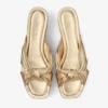 Avenue Wedge 50 Mules con zeppa in nappa metallizzata dorata Avenue Wedge 50 Mules con zeppa in nappa metallizzata dorata