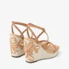Ayla 110 Zeppe in pelle scamosciata e nappa color caramello e naturale con raffia pregiata Ayla 110 Zeppe in pelle scamosciata e nappa color caramello e naturale con raffia pregiata
