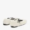 Ballerine Eleri in shearling naturale con ciondolo a perla Ballerine Eleri in shearling naturale con ciondolo a perla