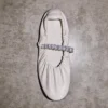 Ballerine Jade in morbida nappa color latte con cinturino in cristallo