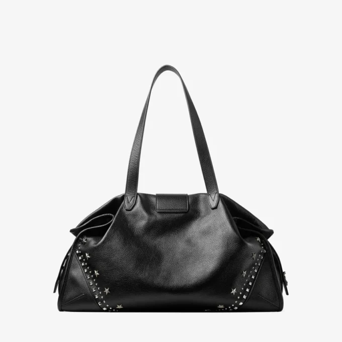 Bar Holdall Large: borsa tote nera in morbida pelle di vitello martellata con stelle in rilievo Bar Holdall Large: borsa tote nera in morbida pelle di vitello martellata con stelle in rilievo