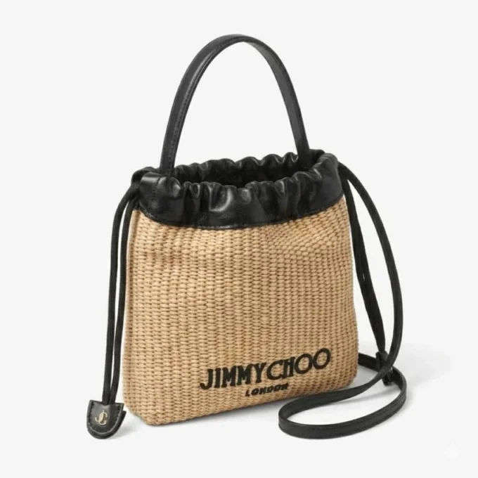 Borsa a cordoncino con manico superiore Borsa a cordoncino in rafia morbida naturale e nera con finiture in pelle Borsa a cordoncino con manico superiore Borsa a cordoncino in rafia morbida naturale e nera con finiture in pelle