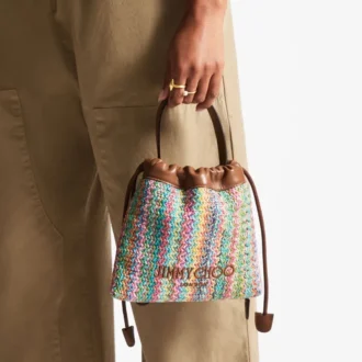 Borsa a coulisse con manico superiore Borsa a coulisse in rafia multicolore e color cuoio con motivo a zig-zag e finiture in pelle