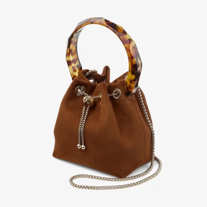 Borsa a secchiello Bon Bon in pelle scamosciata color cuoio con chiusura a perline e manico tartarugato Borsa a secchiello Bon Bon in pelle scamosciata color cuoio con chiusura a perline e manico tartarugato
