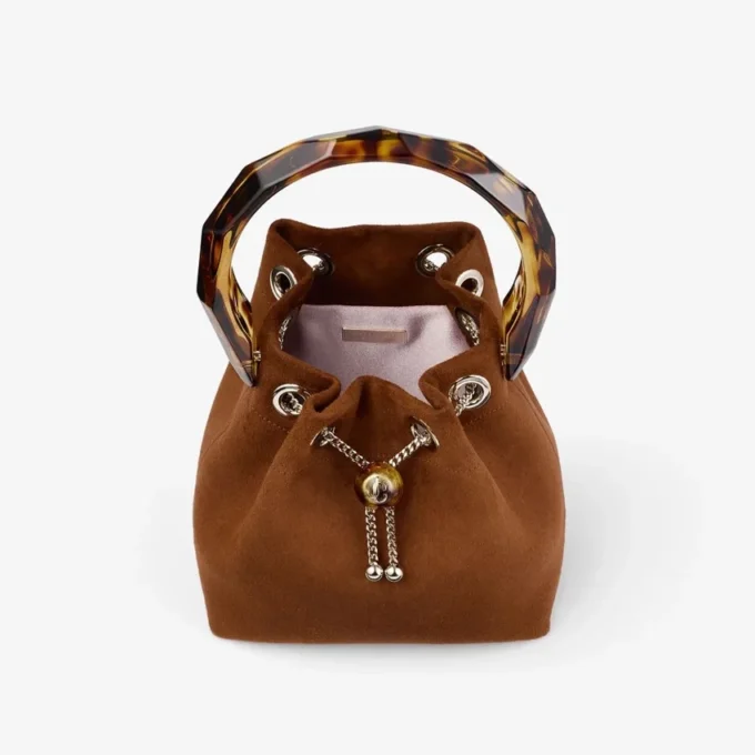 Borsa a secchiello Bon Bon in pelle scamosciata color cuoio con chiusura a perline e manico tartarugato Borsa a secchiello Bon Bon in pelle scamosciata color cuoio con chiusura a perline e manico tartarugato