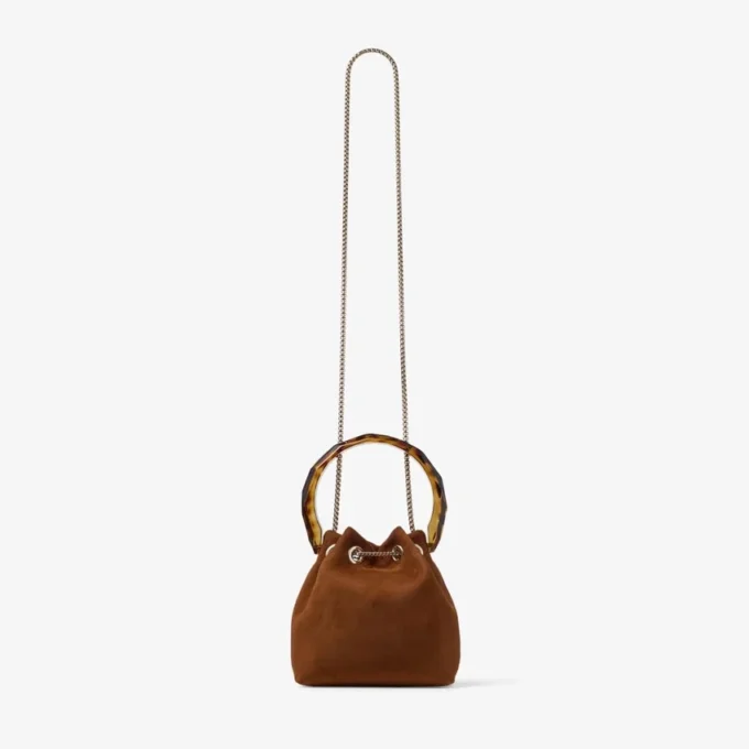 Borsa a secchiello Bon Bon in pelle scamosciata color cuoio con chiusura a perline e manico tartarugato Borsa a secchiello Bon Bon in pelle scamosciata color cuoio con chiusura a perline e manico tartarugato