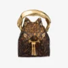 Borsa a secchiello Bon Bon trasparente tartarugata con manico scolpito Borsa a secchiello Bon Bon trasparente tartarugata con manico scolpito