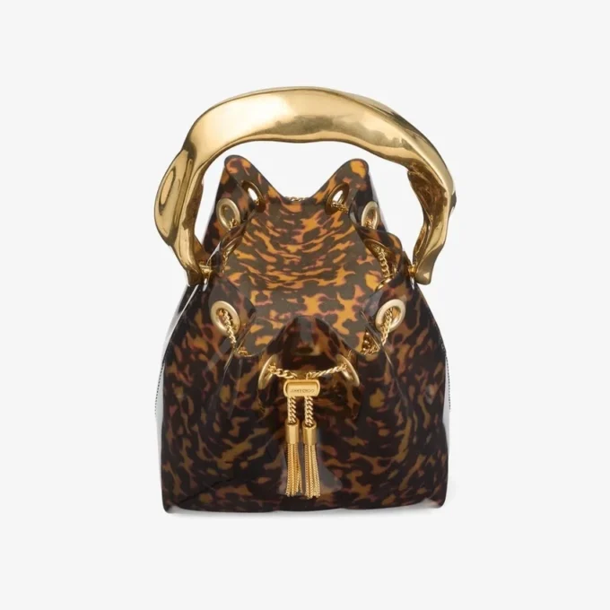 Borsa a secchiello Bon Bon trasparente tartarugata con manico scolpito Borsa a secchiello Bon Bon trasparente tartarugata con manico scolpito