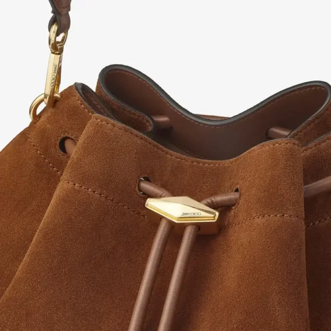 Borsa a tracolla Cinch media in pelle scamosciata color cuoio Borsa a tracolla Cinch media in pelle scamosciata color cuoio
