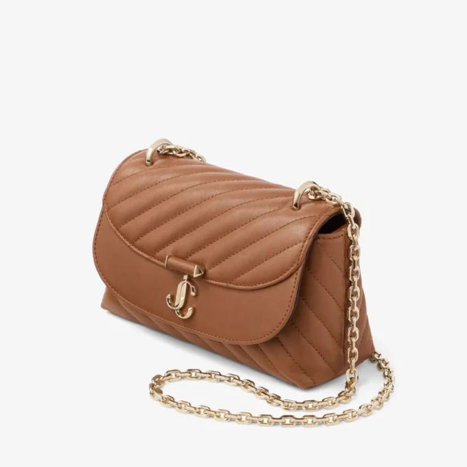 Borsa a tracolla Curve piccola in pelle Biker trapuntata color cuoio Borsa a tracolla Curve piccola in pelle Biker trapuntata color cuoio