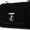 Borsa a tracolla Curve piccola in velluto trapuntato nero con barra Jc in cristallo Borsa a tracolla Curve piccola in velluto trapuntato nero con barra Jc in cristallo