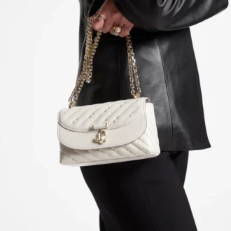 Borsa a tracolla piccola Curve in nappa trapuntata color latte