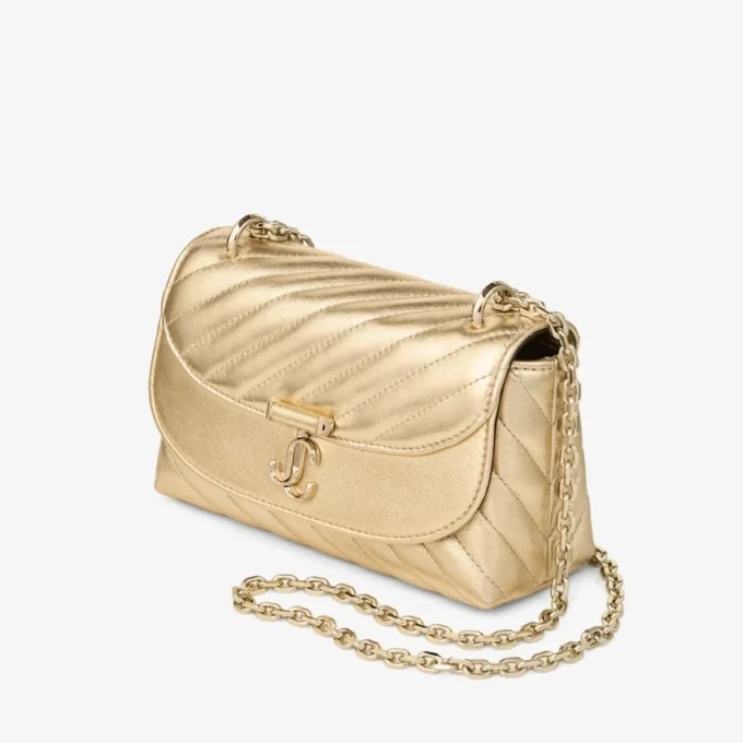 Borsa a tracolla piccola Curve in pelle nappa metallizzata trapuntata dorata Borsa a tracolla piccola Curve in pelle nappa metallizzata trapuntata dorata