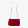 Borsa a tracolla piccola Curve in velluto trapuntato rosso rubino con barra JC in cristallo Borsa a tracolla piccola Curve in velluto trapuntato rosso rubino con barra JC in cristallo