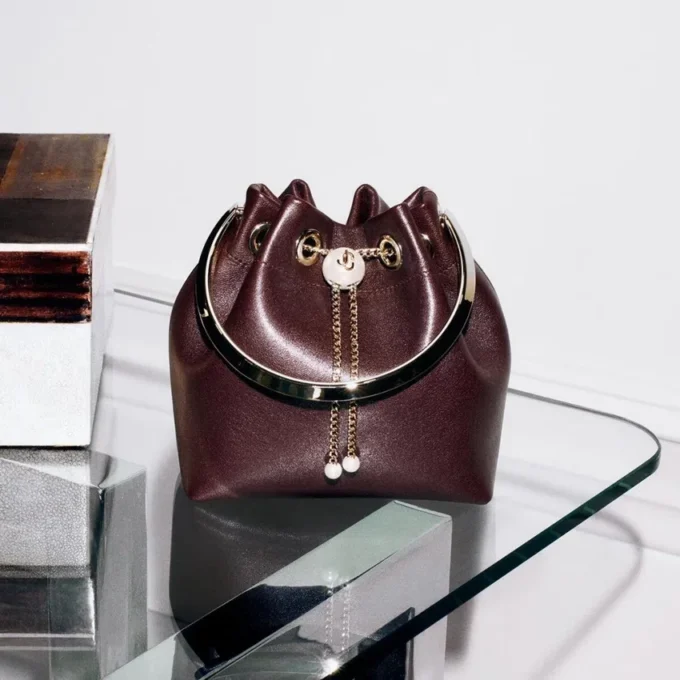 Borsa Bon Bon in pelle Biker color merlot intenso con chiusura a perla Borsa Bon Bon in pelle Biker color merlot intenso con chiusura a perla