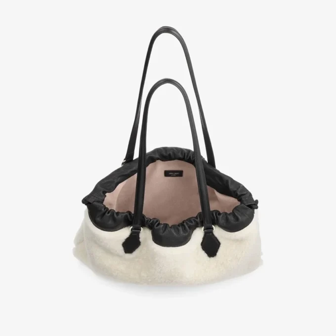 Borsa tote con coulisse Borsa tote media in shearling naturale con coulisse e finiture in pelle