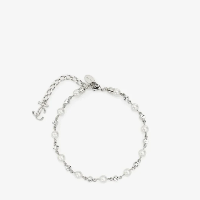 Cavigliera con perla e cristalli Cavigliera in metallo con finitura argento con ciondoli a forma di perla, cristallo e monogramma Jc Cavigliera con perla e cristalli Cavigliera in metallo con finitura argento con ciondoli a forma di perla, cristallo e monogramma Jc