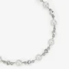 Cavigliera con perla e cristalli Cavigliera in metallo con finitura argento con ciondoli a forma di perla, cristallo e monogramma Jc Cavigliera con perla e cristalli Cavigliera in metallo con finitura argento con ciondoli a forma di perla, cristallo e monogramma Jc