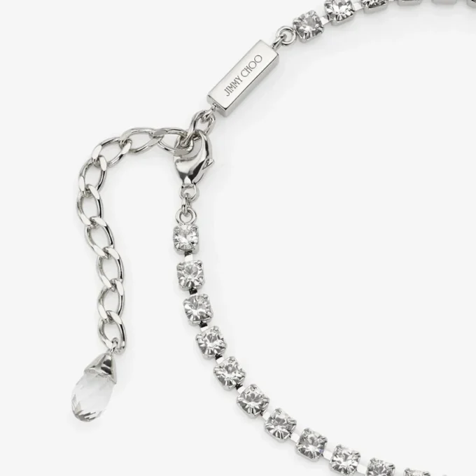 Cavigliera Saeda Cavigliera in metallo con finitura argento e cristalli Cavigliera Saeda Cavigliera in metallo con finitura argento e cristalli