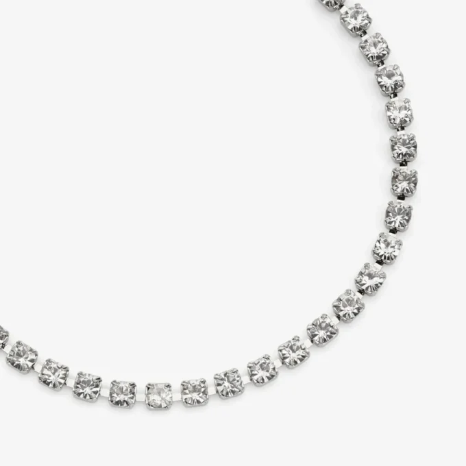 Cavigliera Saeda Cavigliera in metallo con finitura argento e cristalli Cavigliera Saeda Cavigliera in metallo con finitura argento e cristalli