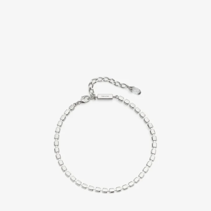 Cavigliera Saeda Cavigliera in metallo con finitura argento e cristalli Cavigliera Saeda Cavigliera in metallo con finitura argento e cristalli