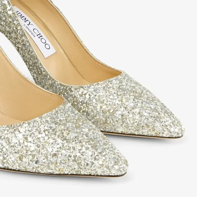 Décolleté Romy 85 con punta affusolata in tessuto glitterato grossolano color champagne
