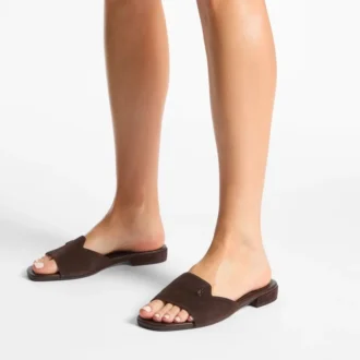 Dina Flat Sandalo con cinturino incrociato in pelle nappa nera
