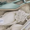 Mimmi Sling Back 50 Latte Sandali con cinturino posteriore in pelle nappa lucida con decorazione in pizzo Mimmi Sling Back 50 Latte Sandali con cinturino posteriore in pelle nappa lucida con decorazione in pizzo