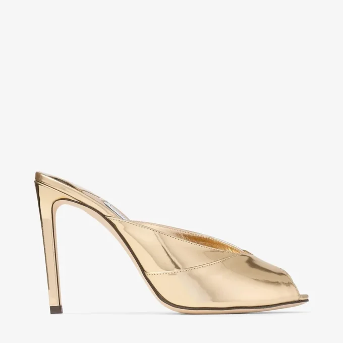 Mule Brigitte 100 in pelle metallizzata liquida dorata Mule Brigitte 100 in pelle metallizzata liquida dorata