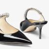 Mules Bing 65 in vernice nera con cinturino in cristallo Mules Bing 65 in vernice nera con cinturino in cristallo