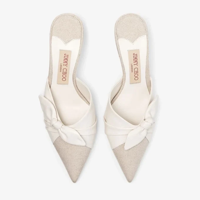 Mules Livi 65 in tela screziata color mandorla e latte e morbida pelle a guanto con fiocco in pelle nappa Mules Livi 65 in tela screziata color mandorla e latte e morbida pelle a guanto con fiocco in pelle nappa