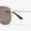 Occhiali da sole in metallo Pantos Dune oro pallido e marrone scuro Occhiali da sole in metallo Pantos Dune oro pallido e marrone scuro