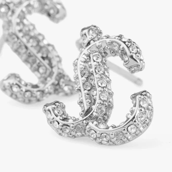 Orecchini a bottone Jc in metallo con finitura argento e cristalli Swarovski Orecchini a bottone Jc in metallo con finitura argento e cristalli Swarovski