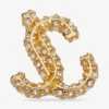 Orecchini a bottone Jc in metallo con finitura dorata e cristalli Swarovski Orecchini a bottone Jc in metallo con finitura dorata e cristalli Swarovski