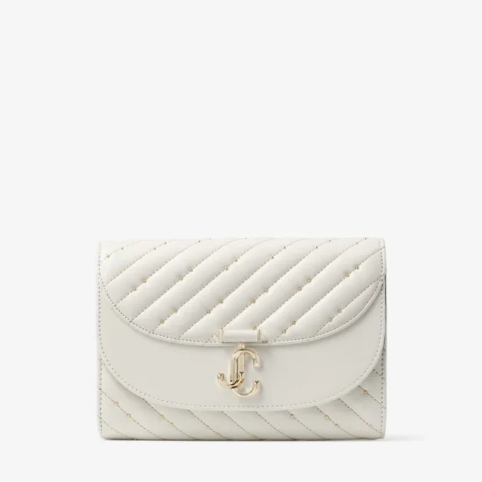 Pochette Avenue Curve in pelle nappa trapuntata color latte Pochette Avenue Curve in pelle nappa trapuntata color latte