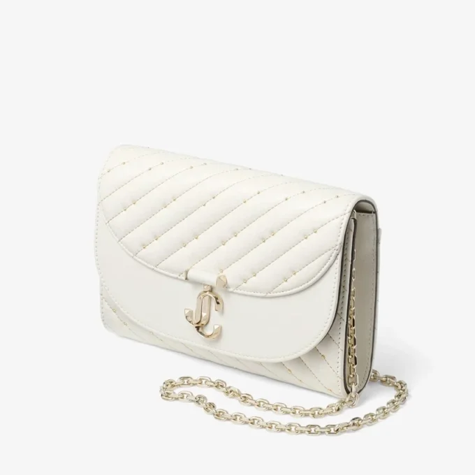 Pochette Avenue Curve in pelle nappa trapuntata color latte Pochette Avenue Curve in pelle nappa trapuntata color latte