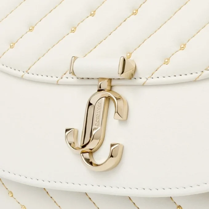 Pochette Avenue Curve in pelle nappa trapuntata color latte Pochette Avenue Curve in pelle nappa trapuntata color latte