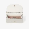 Pochette Avenue Curve in pelle nappa trapuntata color latte Pochette Avenue Curve in pelle nappa trapuntata color latte