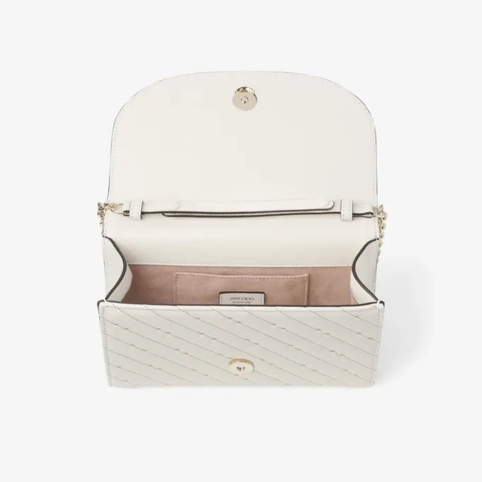 Pochette Avenue Curve in pelle nappa trapuntata color latte Pochette Avenue Curve in pelle nappa trapuntata color latte