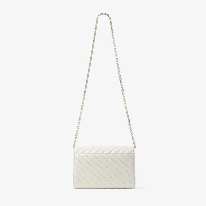 Pochette Avenue Curve in pelle nappa trapuntata color latte Pochette Avenue Curve in pelle nappa trapuntata color latte