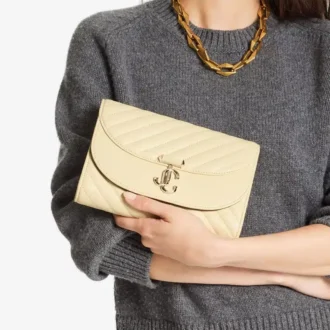 Pochette Curve in pelle Biker trapuntata color burro