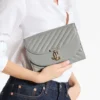 Pochette Curve in pelle Biker trapuntata color tortora Pochette Curve in pelle Biker trapuntata color tortora