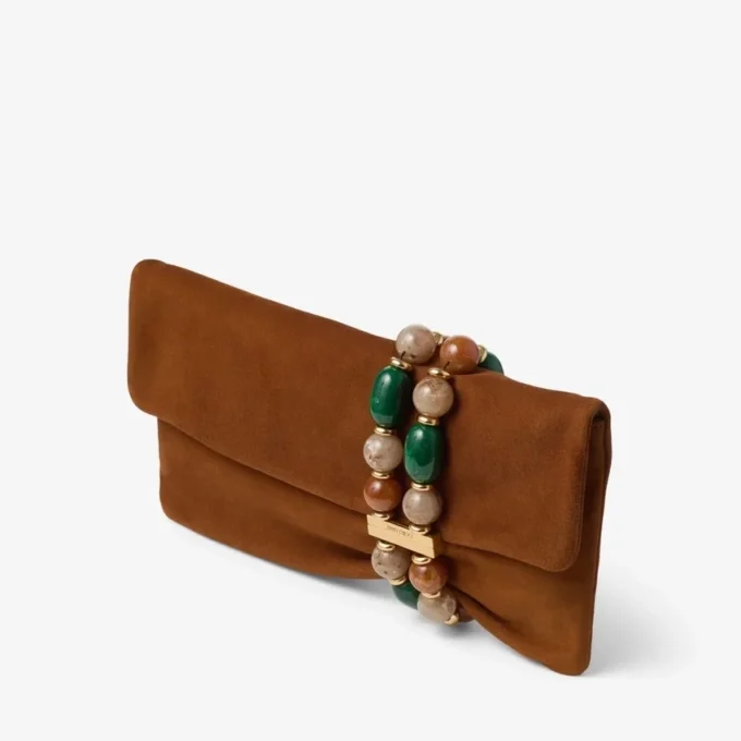 Pochette Zandra in pelle scamosciata color cuoio con bracciale in perline Pochette Zandra in pelle scamosciata color cuoio con bracciale in perline