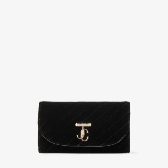 Portafoglio Curve con catena Mini borsa in velluto trapuntato nero con barra JC in cristallo