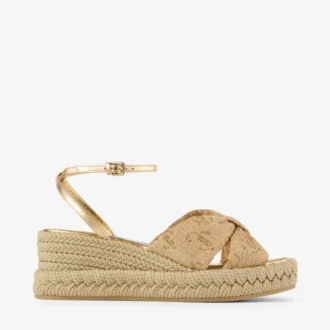 Sandali con zeppa Aella 60 in rafia dorata