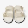 Sandali Fayence in pelle verniciata metallizzata color champagne con perle Sandali Fayence in pelle verniciata metallizzata color champagne con perle